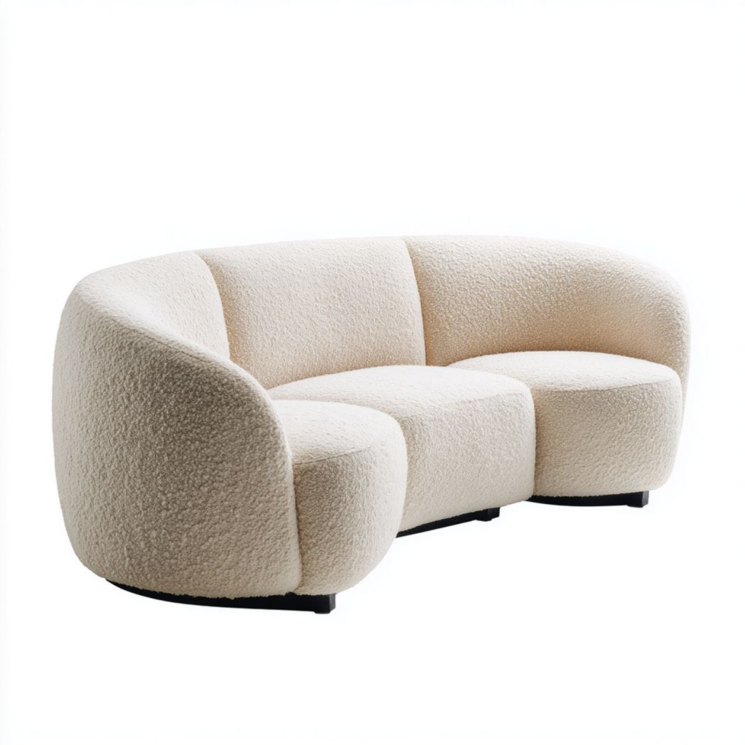 Sofá de tres plazas en tejido bouclé color crema con base de metal negro